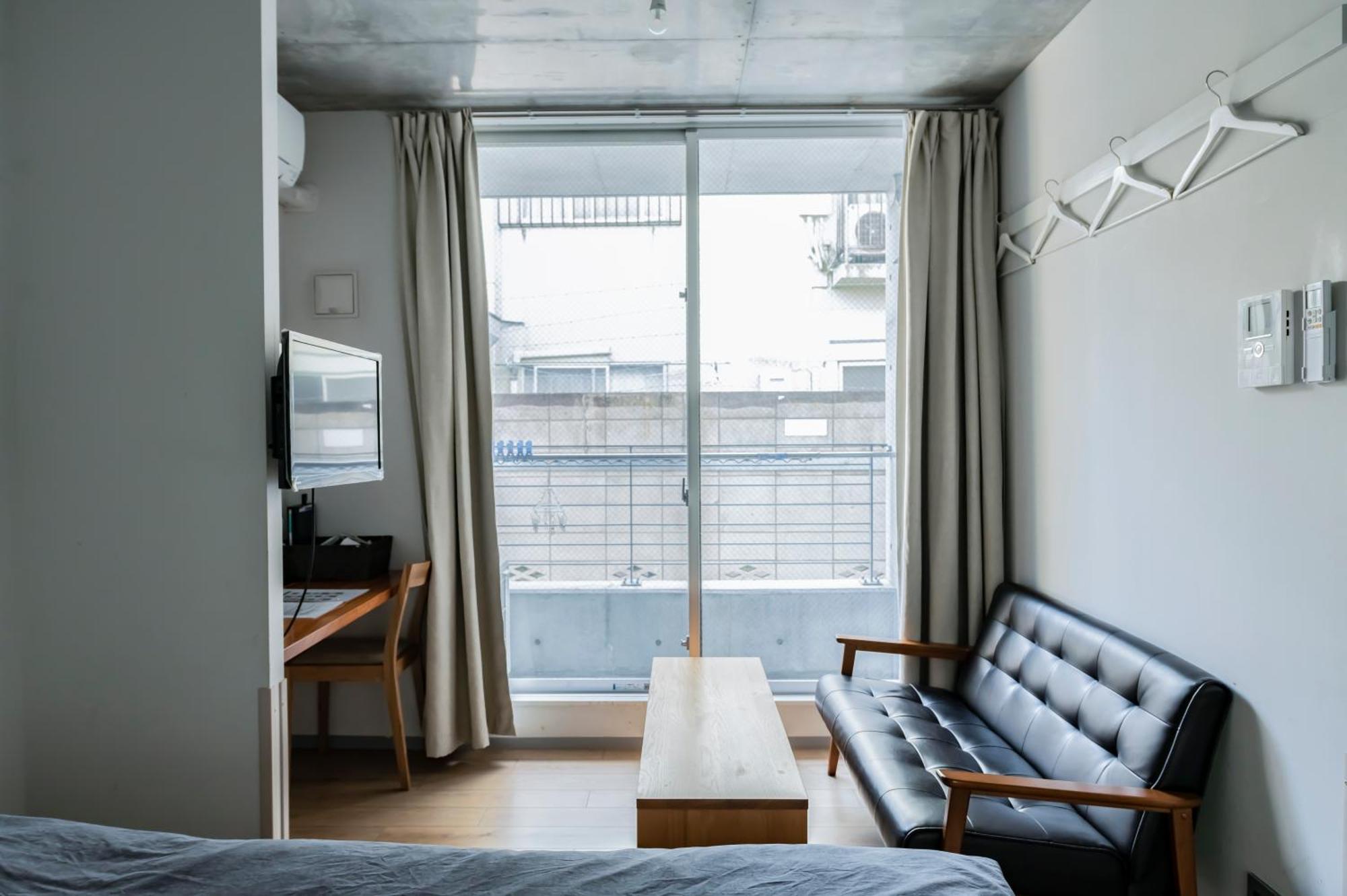 Апартаменты Bmj Shinjuku Okubo Токио Номер фото